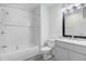 Modern bathroom featuring a shower-tub combo and stylish vanity with new fixtures at 916 Tyan St St, Rocky Mount, NC 27801