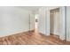 Spacious bedroom with hardwood floors, closet and a connecting door to another room at 916 Tyan St St, Rocky Mount, NC 27801