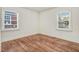 Bright bedroom with hardwood floors, large windows offering plenty of natural light at 916 Tyan St St, Rocky Mount, NC 27801