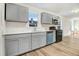 Updated kitchen featuring stainless steel appliances, sleek countertops and ample cabinet space at 916 Tyan St St, Rocky Mount, NC 27801