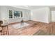 Bright living room featuring hardwood floors, natural light and a modern aesthetic at 916 Tyan St St, Rocky Mount, NC 27801