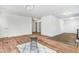 Spacious living room featuring beautiful floors, neutral walls and an open concept design at 916 Tyan St St, Rocky Mount, NC 27801