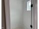 Closet with a narrow window providing natural light at 9160 Dupree Meadow Dr # 13, Angier, NC 27501