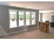 Spacious living room with ample natural light from a large set of windows looking to the yard at 9160 Dupree Meadow Dr # 13, Angier, NC 27501