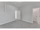 Bedroom features soft carpeting and doorway to bathroom and walk-in closet at 9168 Dupree Meadow Dr # 15, Angier, NC 27501