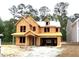Unfinished two-story home featuring a two-car garage and classic architectural details awaiting your personal touch at 9168 Dupree Meadow Dr # 15, Angier, NC 27501