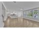 Bright living room with hardwood floors, white trim, and views to the outside at 9168 Dupree Meadow Dr # 15, Angier, NC 27501
