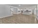 Open-concept living room and kitchen with hardwood floors and recessed lighting at 9168 Dupree Meadow Dr # 15, Angier, NC 27501