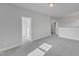 Upstairs open loft area with neutral carpet, paint and trim; bright and inviting at 9168 Dupree Meadow Dr # 15, Angier, NC 27501