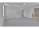 Spacious main bedroom features carpet, white trim, fan, and ensuite bath at 9168 Dupree Meadow Dr # 15, Angier, NC 27501