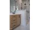 Bathroom featuring a light wood vanity and a modern glass enclosed shower at 970 Double Helix Rd, Apex, NC 27523