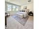 Bright main bedroom with a neutral palette, large windows, and lots of light at 970 Double Helix Rd, Apex, NC 27523