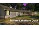 Ranch-style home with a three-car garage and a well-manicured front yard at 98 Beach Ln, Henderson, NC 27537