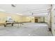 Spacious garage featuring multiple bay doors and room for parking at 98 Beach Ln, Henderson, NC 27537