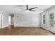 Spacious living room features a ceiling fan and hardwood floors at 98 Beach Ln, Henderson, NC 27537