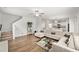 Spacious living room connects seamlessly to the kitchen, offering a cohesive and inviting atmosphere at 10 Forest Brook Way, Clayton, NC 27520