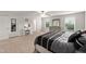 Bedroom with neutral walls, carpet and ensuite with dressing table at 10 Forest Brook Way, Clayton, NC 27520