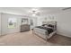 Bedroom with neutral-toned walls, carpet, ceiling fan, and a dresser with mirror at 10 Forest Brook Way, Clayton, NC 27520