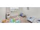 Playful room featuring three toddler beds with colorful bedding at 10 Forest Brook Way, Clayton, NC 27520
