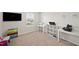 Bright room with multiple desks and shelving, perfect for study and play at 10 Forest Brook Way, Clayton, NC 27520
