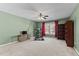Basement rec room featuring exercise equipment and a ceiling fan at 1007 Olde Midway Ct, Knightdale, NC 27545