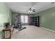 Basement rec room featuring a ceiling fan and carpeted flooring at 1007 Olde Midway Ct, Knightdale, NC 27545