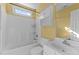 Bathroom showcasing white tub and shower combo with updated hardware at 1007 Olde Midway Ct, Knightdale, NC 27545