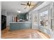 Open concept kitchen and dining area filled with natural light at 1007 Olde Midway Ct, Knightdale, NC 27545