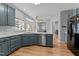 Modern kitchen with sleek countertops, updated appliances, and an open layout at 1007 Olde Midway Ct, Knightdale, NC 27545