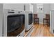 Modern washer and dryer set in laundry room with new flooring at 1007 Olde Midway Ct, Knightdale, NC 27545