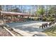 Community picnic pavilion with benches and an outdoor fireplace at 1007 Olde Midway Ct, Knightdale, NC 27545