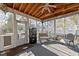 Charming screened porch with a mini-fridge and an outdoor backyard view at 1007 Olde Midway Ct, Knightdale, NC 27545