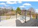 Spacious back deck featuring outdoor dining and a backyard view at 1033 Forest Glen Dr, Raleigh, NC 27603