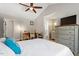 Comfortable main bedroom with vaulted ceiling, desk space, and adjoining bathroom at 1033 Forest Glen Dr, Raleigh, NC 27603