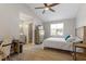 Inviting main bedroom with vaulted ceiling, neutral tones, and adjoining bathroom at 1033 Forest Glen Dr, Raleigh, NC 27603