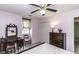Bedroom featuring pink walls, neutral carpeting, a ceiling fan, a window and bureau at 104 Province Cir, Rocky Mount, NC 27804