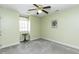 Bedroom featuring light green walls, neutral carpeting, a ceiling fan and a window at 104 Province Cir, Rocky Mount, NC 27804