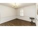 Bright dining room with hardwood floors and a classic chandelier at 104 Province Cir, Rocky Mount, NC 27804