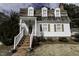 Charming home with a brick walkway leading to the front entrance at 104 Province Cir, Rocky Mount, NC 27804