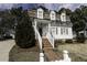 Inviting home with dormer windows, brick steps, and a decorative front door at 104 Province Cir, Rocky Mount, NC 27804