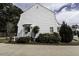 Side view of a well-maintained home with a cozy porch at 104 Province Cir, Rocky Mount, NC 27804