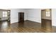 Spacious living room featuring hardwood floors and natural light at 104 Province Cir, Rocky Mount, NC 27804