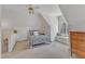 Charming bedroom featuring a unique metal frame bed and a cozy window seat for relaxation at 106 Legault Dr, Cary, NC 27513