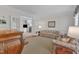 Comfortable Living Room with hardwood floors and view to living room with brick fireplace at 106 Legault Dr, Cary, NC 27513