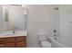 Full bath with single sink vanity and shower over the tub at 110 Darley Dale Loop, Apex, NC 27502