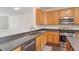 Kitchen with countertop, stainless steel appliances, and gas range at 110 Darley Dale Loop, Apex, NC 27502