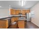 Functional kitchen featuring a center island, stainless steel appliances, and ample cabinetry at 110 Darley Dale Loop, Apex, NC 27502