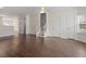 Inviting living room area with open layout, wood floors, and staircase to second floor at 110 Darley Dale Loop, Apex, NC 27502