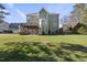 Spacious backyard features a large deck, ample green space, and well-maintained lawn at 1104 Fanning Dr, Wake Forest, NC 27587