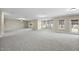 Spacious finished basement featuring neutral carpet, multiple windows, and ample lighting at 1104 Fanning Dr, Wake Forest, NC 27587